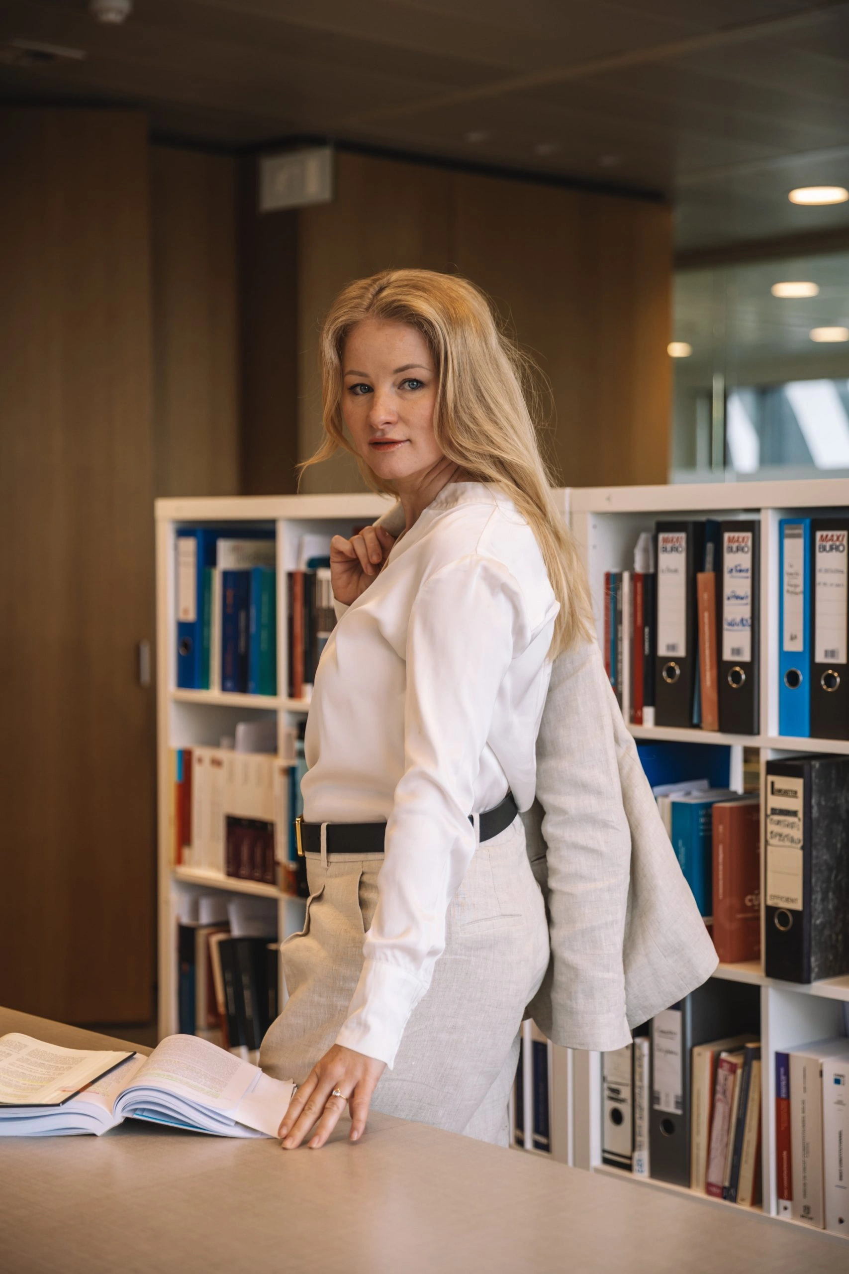 Professional business portrait in a modern office setting