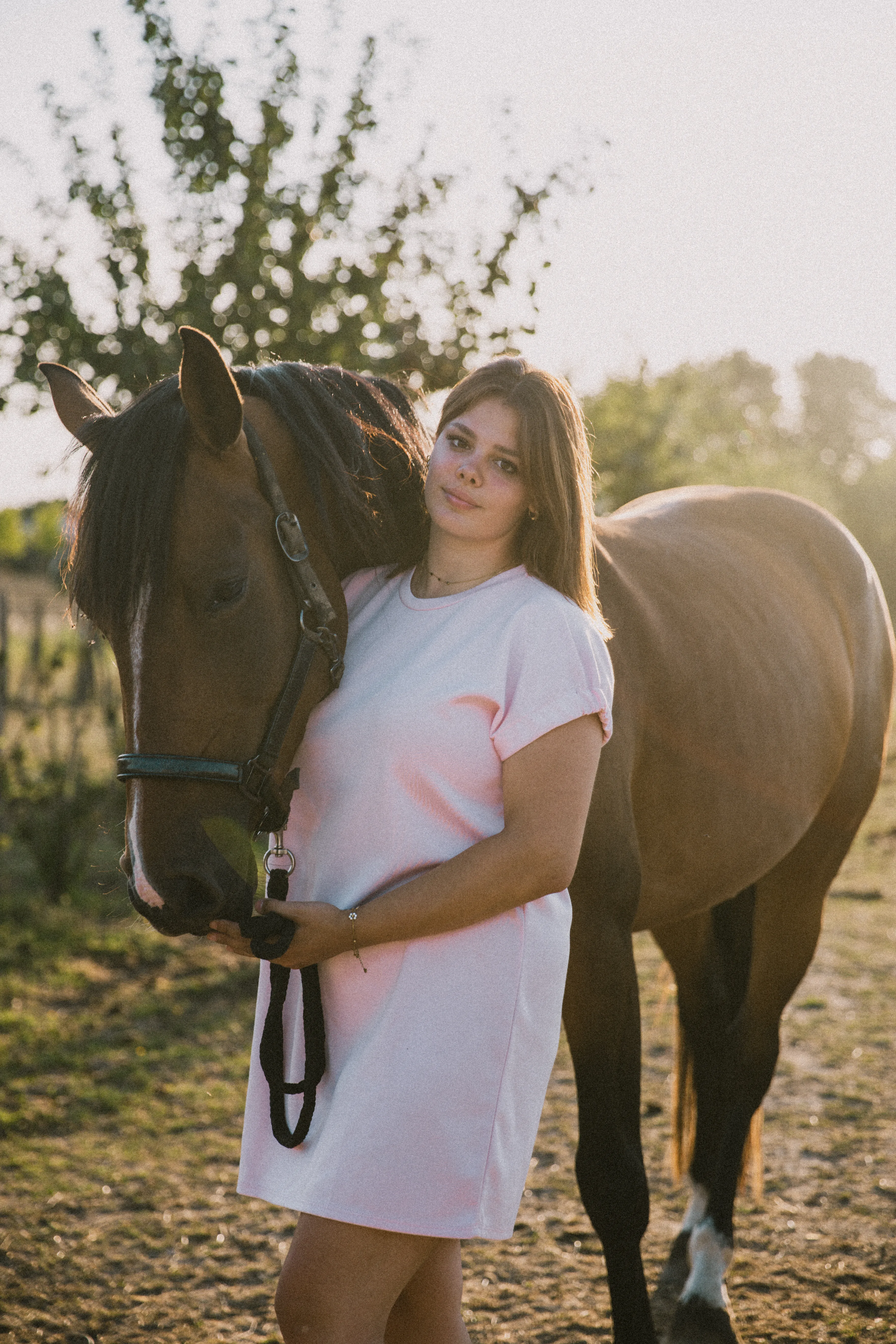 Portrait with horse outdoors